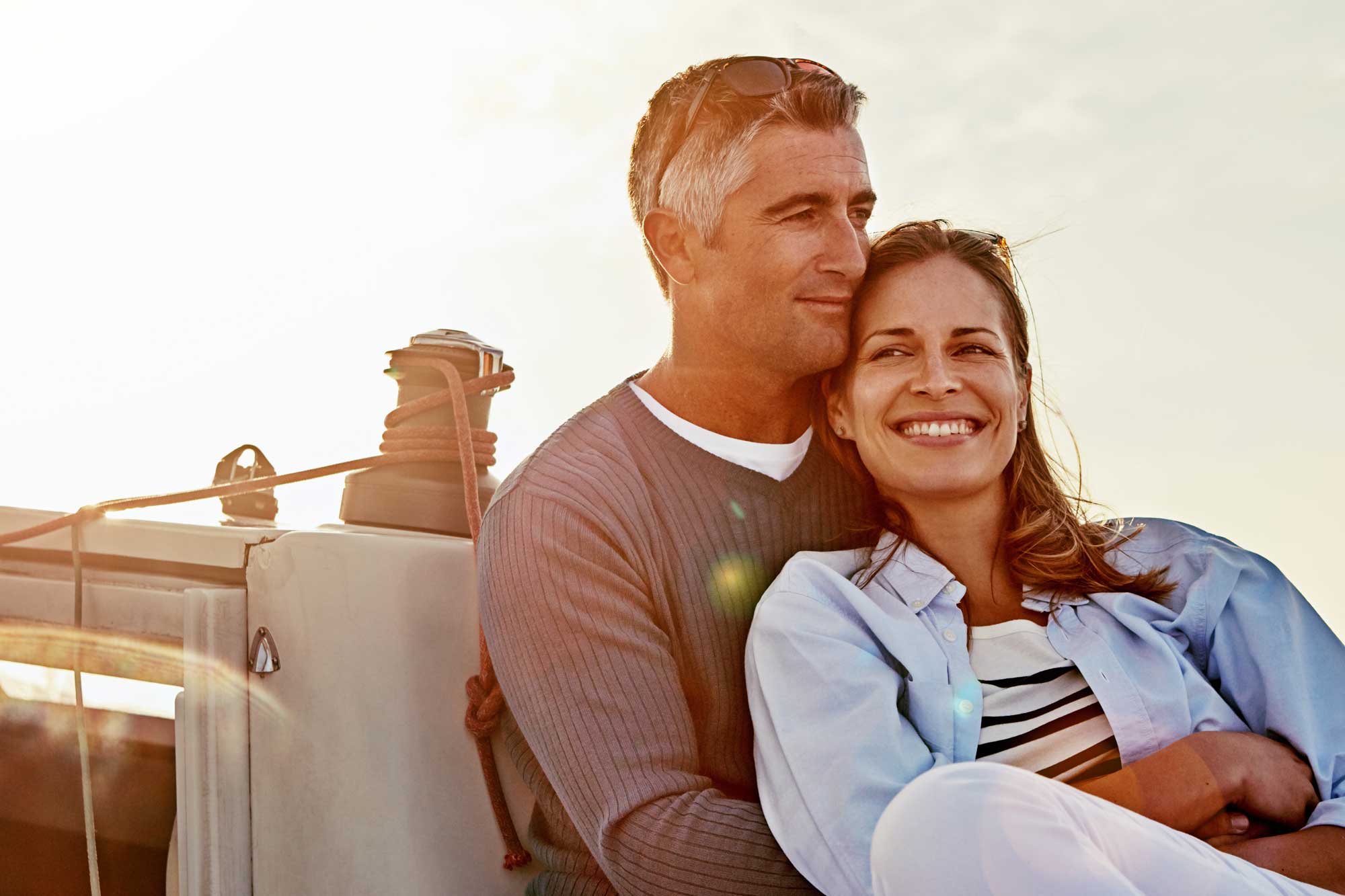 happy retired couple on a boat